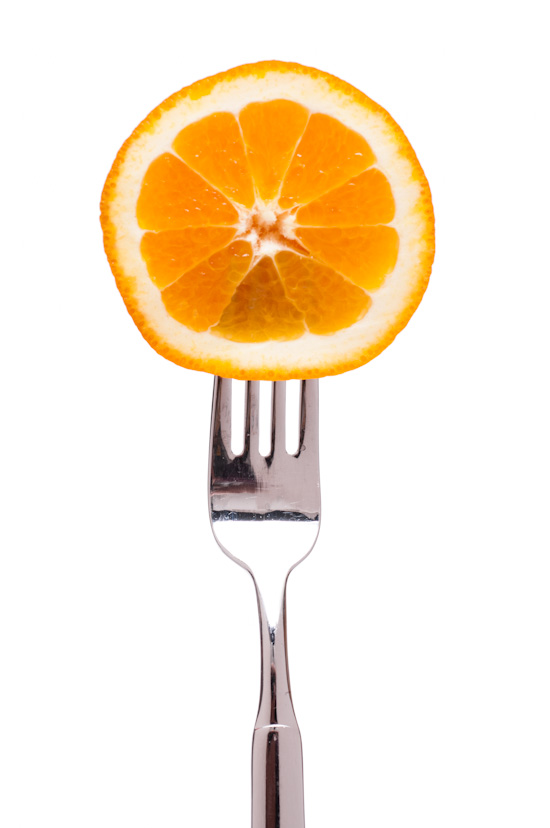 Slice of orange on a fork